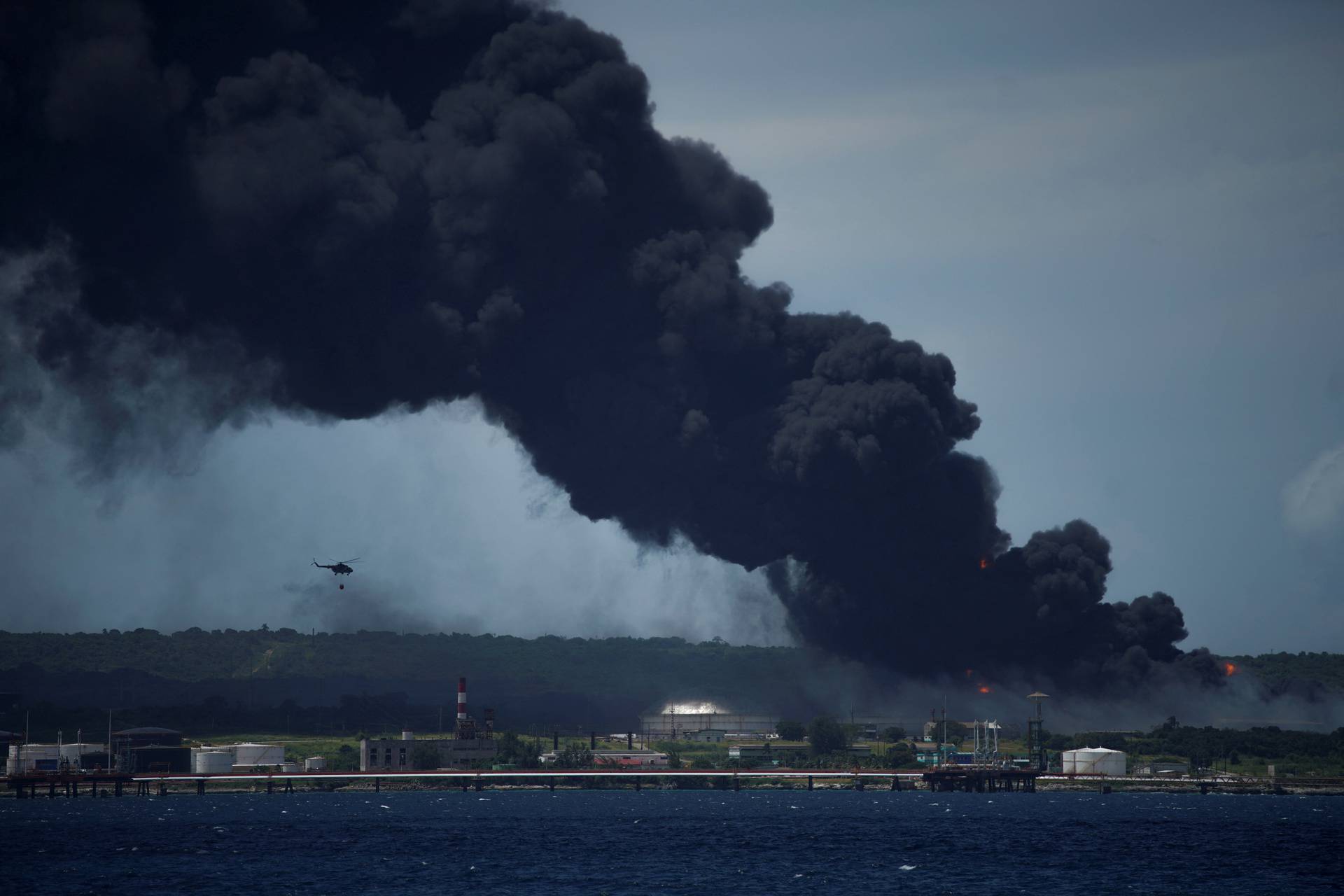 Major fire spreads at Cuban fuel storage facility hit by lightning