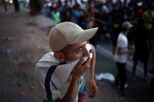 Mass crossings of migrants on foot and by sea from Morocco into Spanish territory, in Ceuta