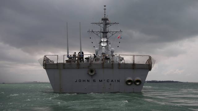 The U.S. Navy guided-missile destroyer USS John S. McCain is seen after a collision, in Singapore waters