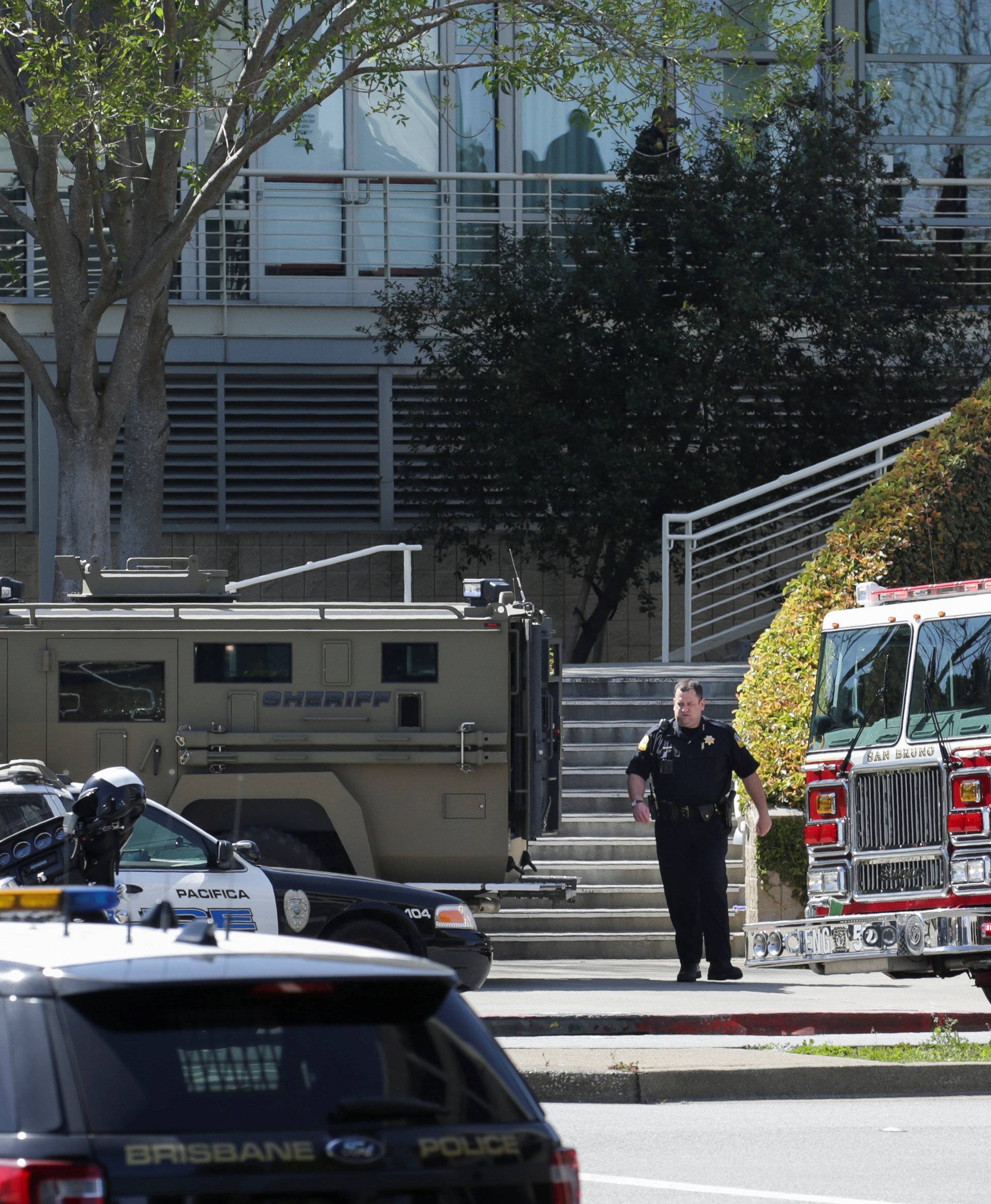 Police officers are seen at Youtube headquarters following an active shooter situation in San Bruno, California