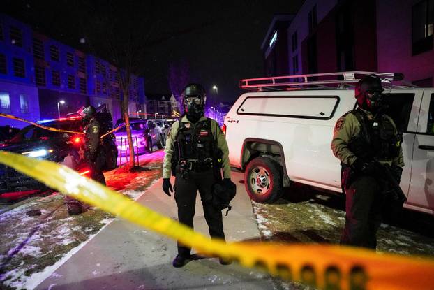 Protest outside the hotel where Bovino, who has been removed from his role, is reportedly staying, in Maple Grove