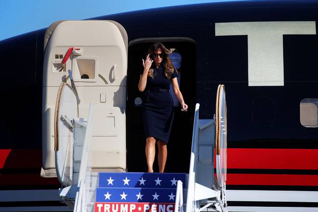 Wife of Republican presidential nominee Donald Trump,  Melania Trump walks off the plane at a campaign rally in Wilmington