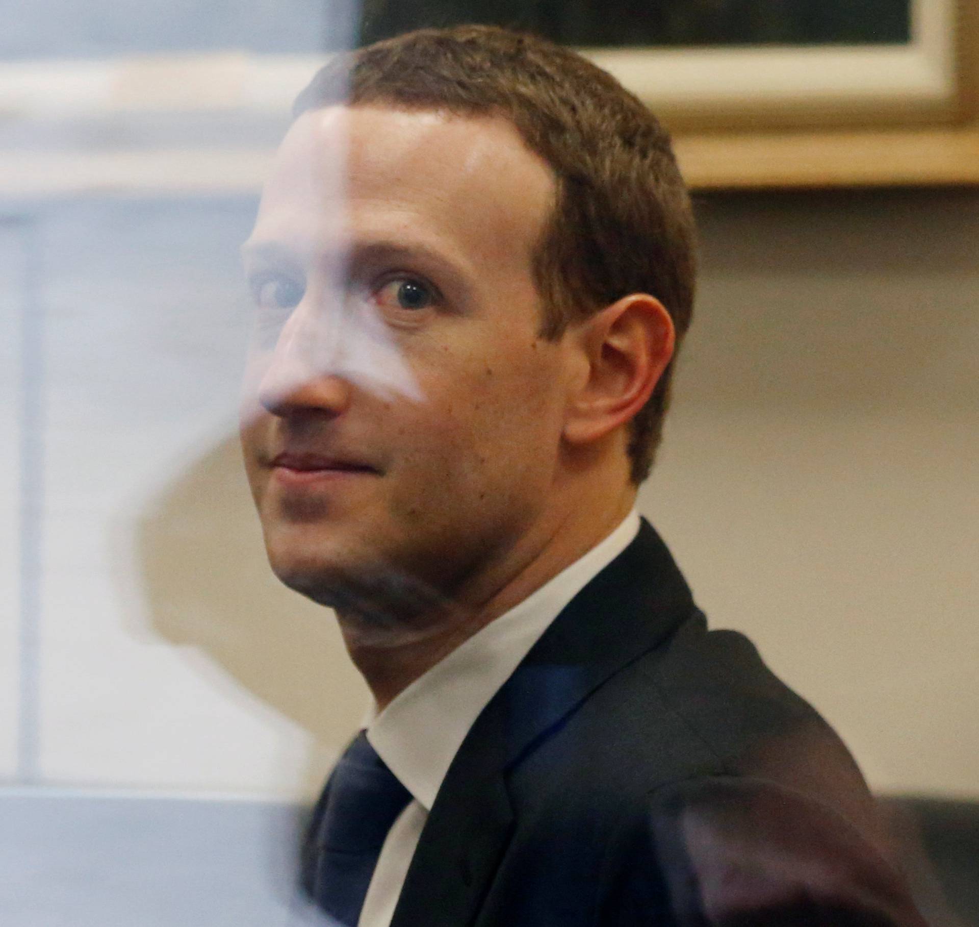 Facebook CEO Zuckerberg waits to meet with Senator Nelson on Capitol Hill in Washington