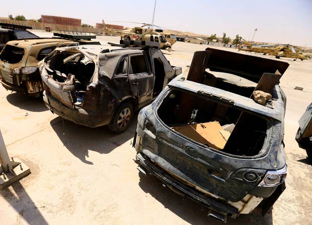 Vehicles used for suicide car bombings, made by Islamic State militants, are seen at Federal Police Headquarters after being confiscated in Mosul