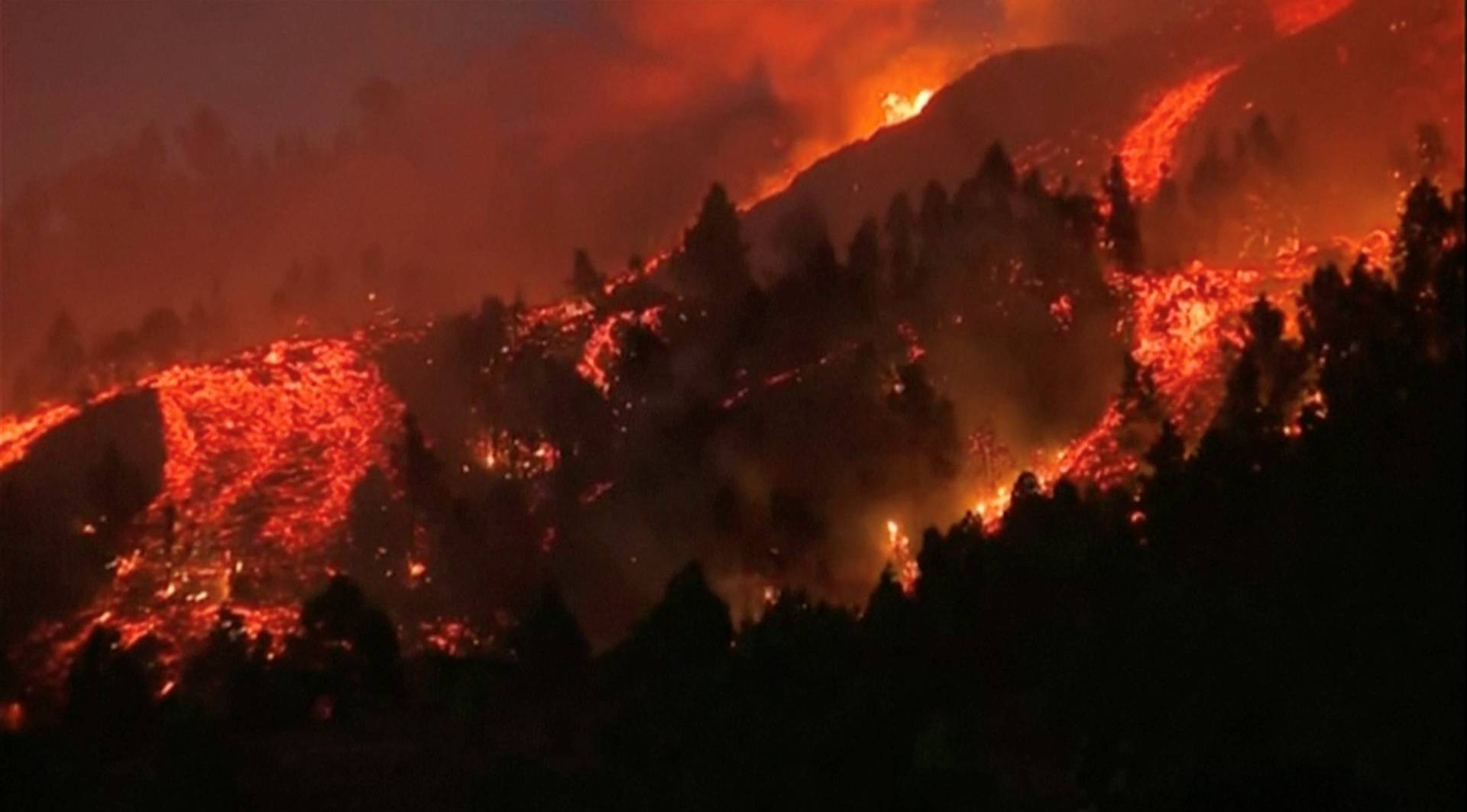 Lava pours out of a volcano on La Palma in Spain's Canary Islands