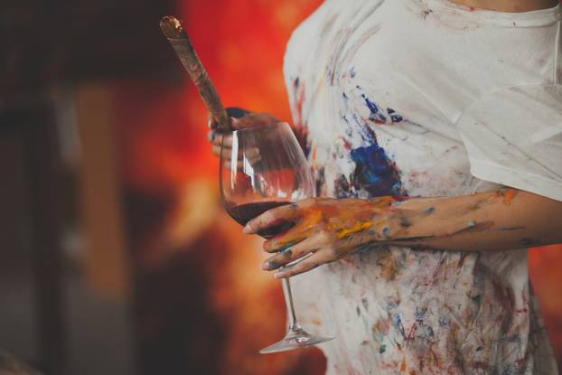 Female,Hands,Of,The,Artist,With,Glass,Of,Wine,,Brushes,