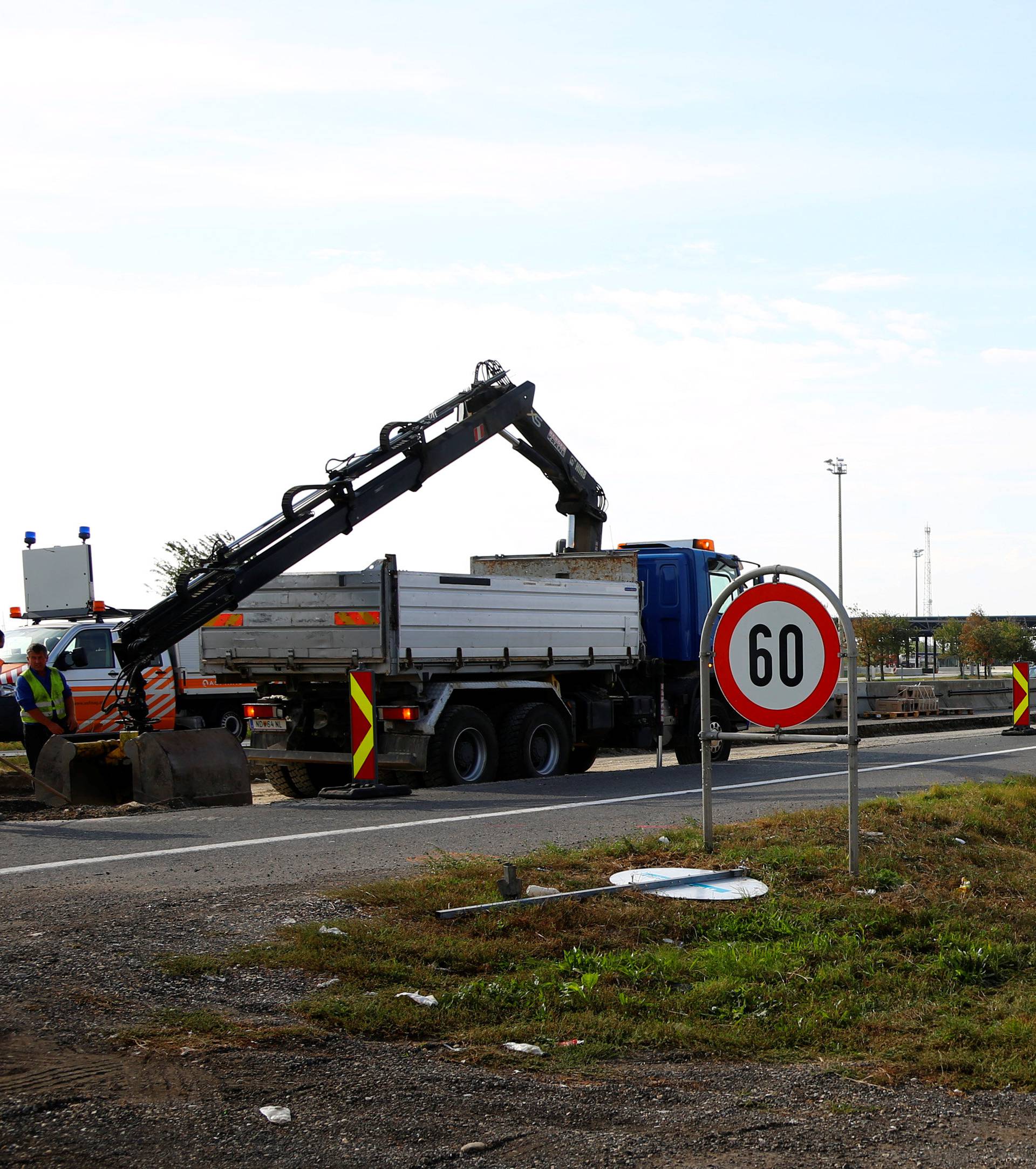 Construction workers are seen at the Austrian-Hungarian border near Nickelsdorf