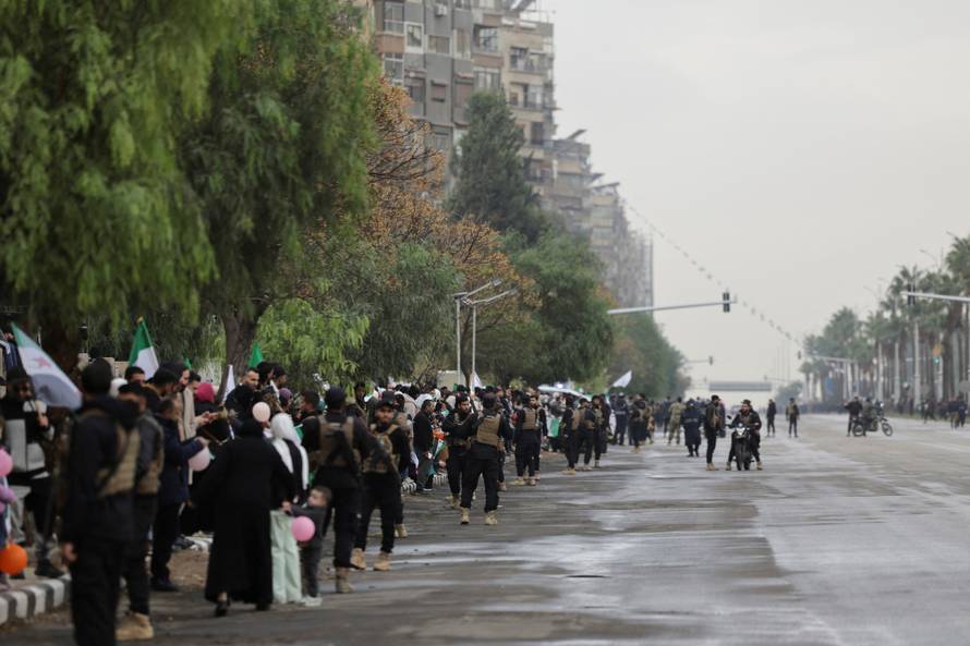 Military parade to mark the first anniversary of Bashar al-Assad's fall, in Damascus