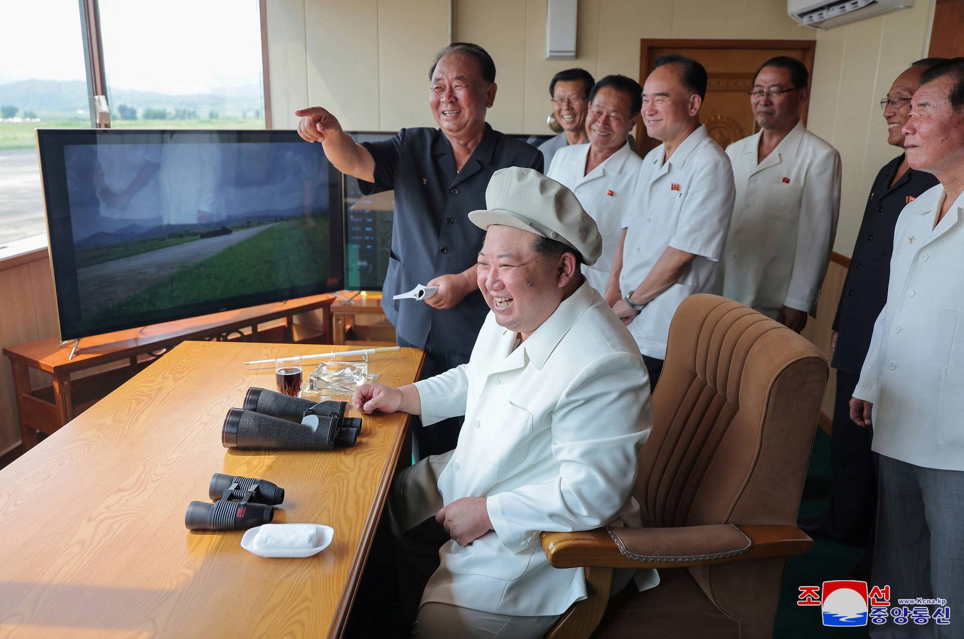 North Korea's Kim Jong Un oversees drone test