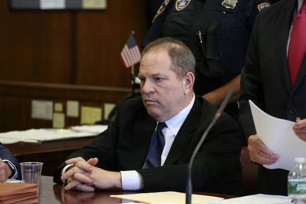 Film producer Harvey Weinstein sits inside Manhattan Criminal Court during an arraignment in the Manhattan borough of New York