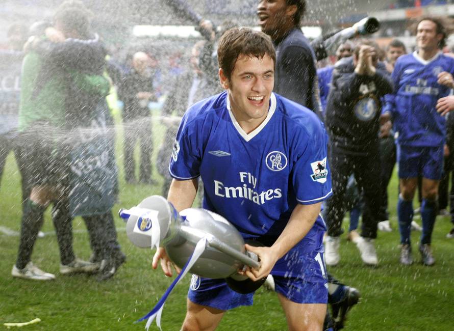 FILE PHOTO: Chelsea's Joe Cole celebrates winning the Premier League title at the Reebok Stadium, Bolton, UK April 30, 2005