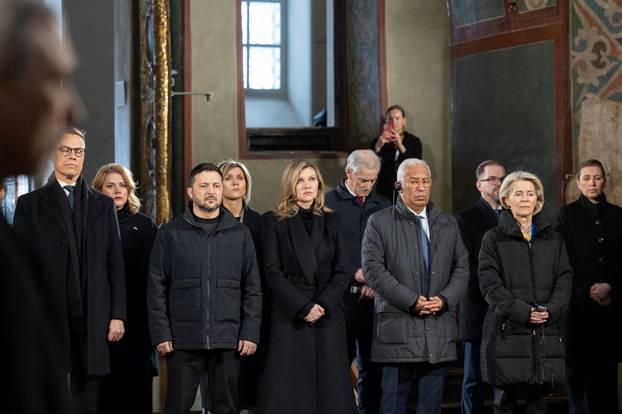 Prayer for peace inside the St. Sophia's Cathedral on the fourth anniversary of Russia's full-scale invasion, in Kyiv