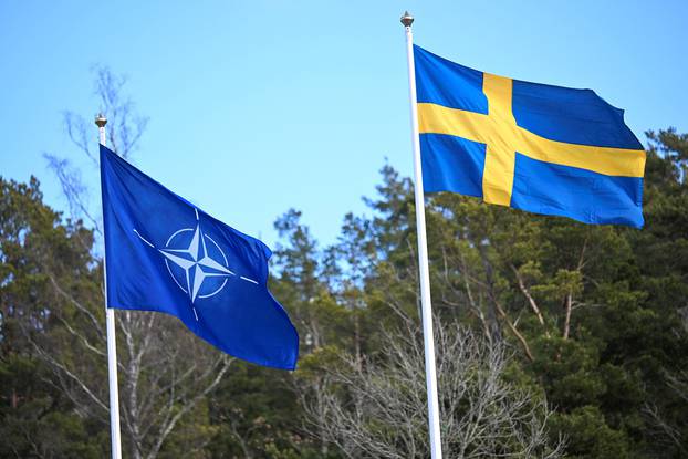 NATO flag is raised at ceremony at Musko navy base near Stockholm