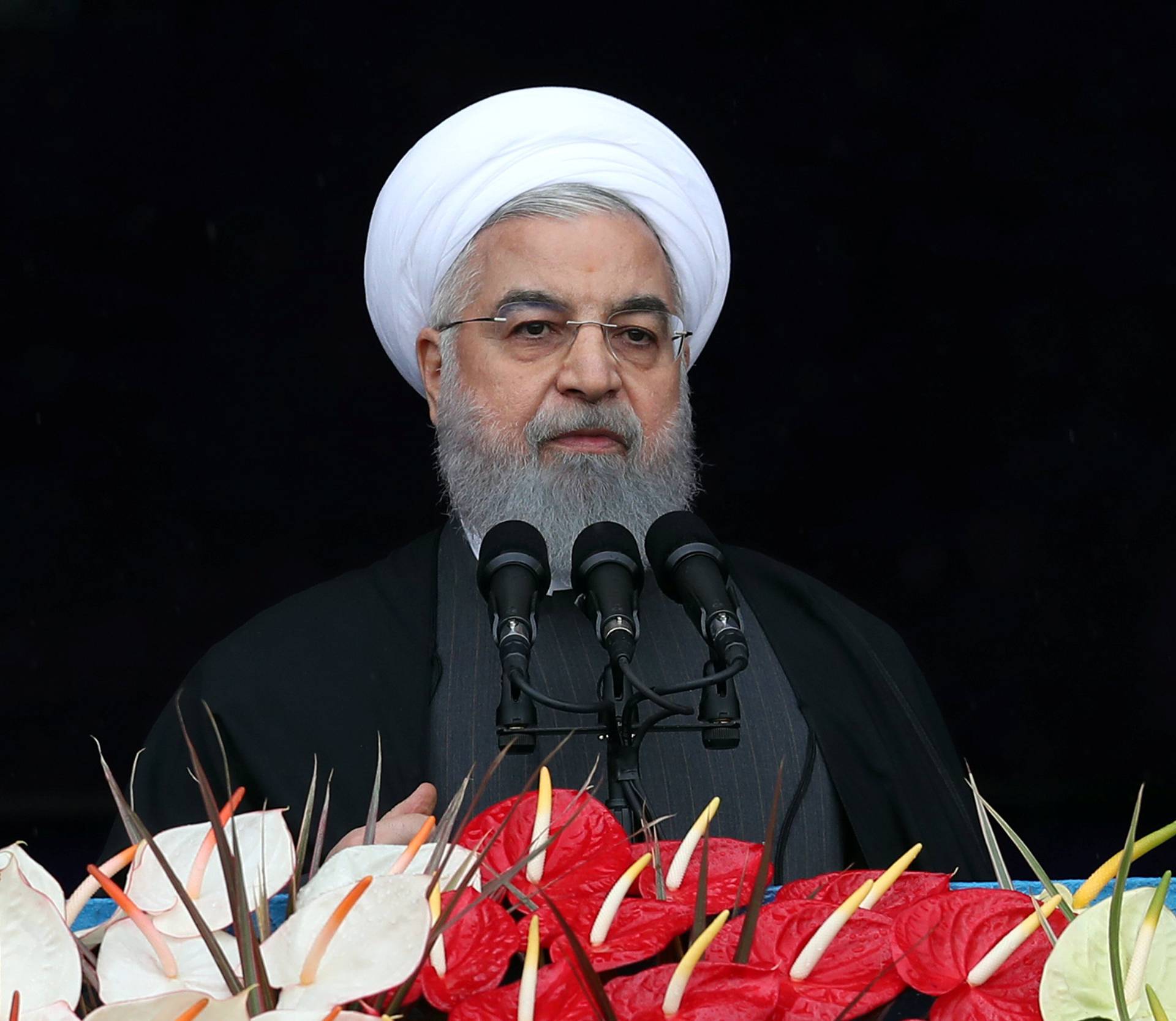 Iran's President Hassan Rouhani speaks during a ceremony to mark the 40th anniversary of the Islamic Revolution in Tehran