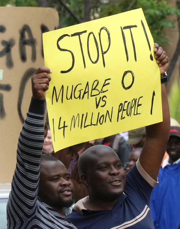 Protesters calling for Zimbabwean President Robert Mugabe to step down take to the streets in Harare