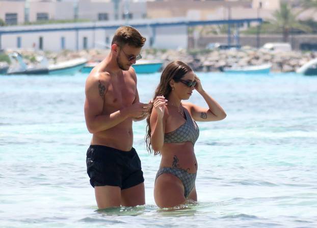 *EXCLUSIVE* Sevilla Croatian footballer Ivan Rakitic pictured having fun on the beach with his partner Raquel Mauri during his holiday in Formentera.