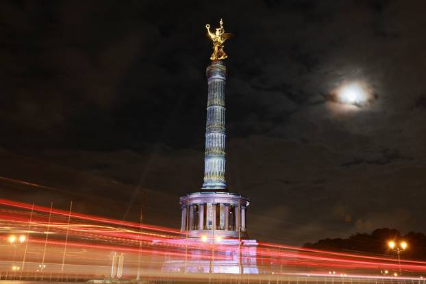 The Victory Column is illuminated during the Festival of Lights in Berlin