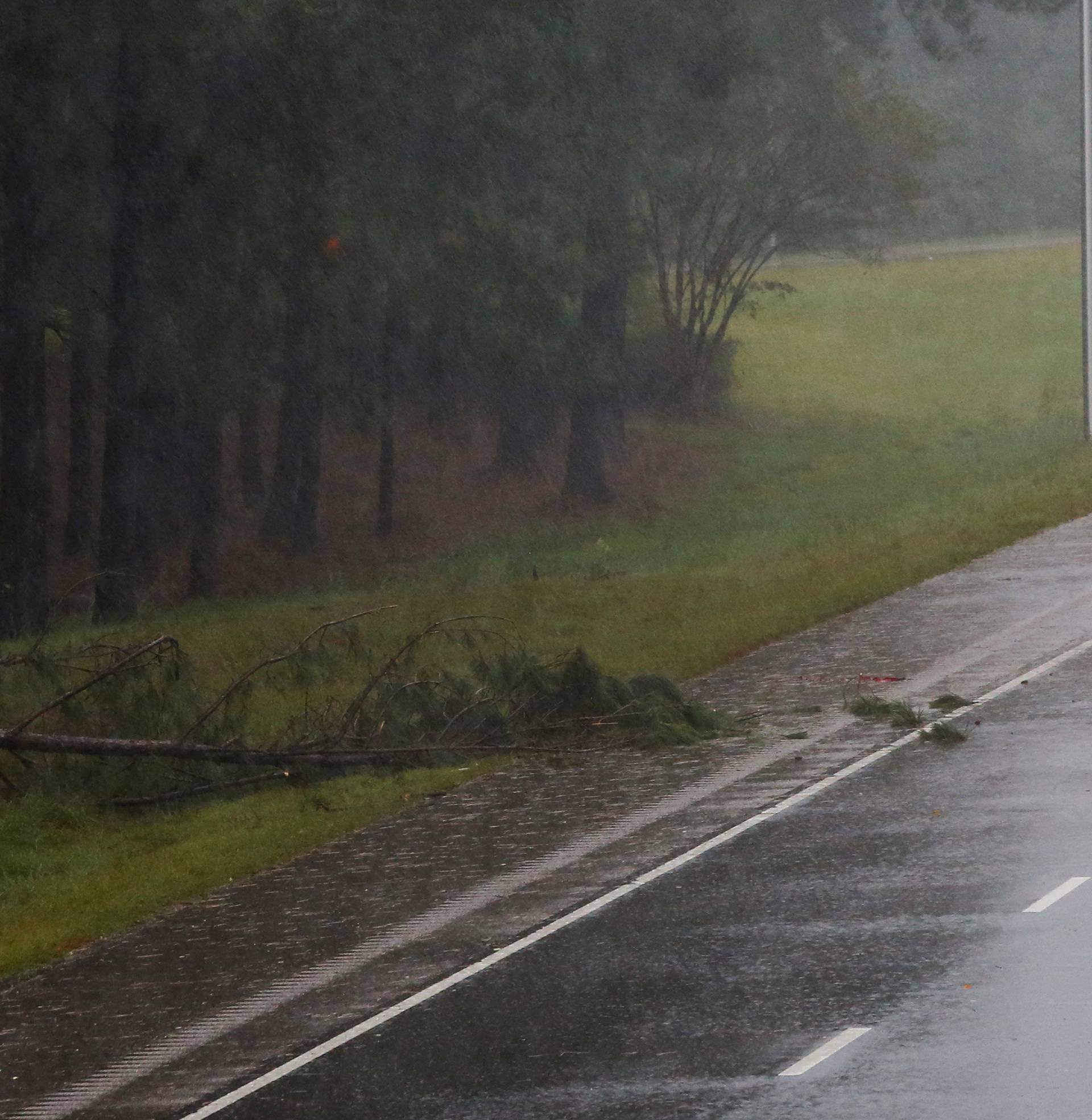 A truck drives along a I 95 Road as winds from Hurricane Florence hit the town of Wilson, North Carolina