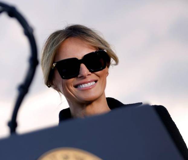 First lady Trump smiles at Joint Base Andrews, Maryland