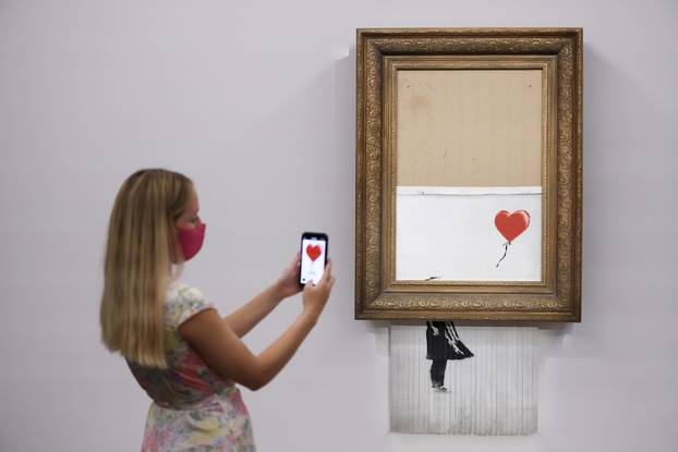 FILE PHOTO: Banksy's 'Love is in the Bin' photocall at Sotheby's