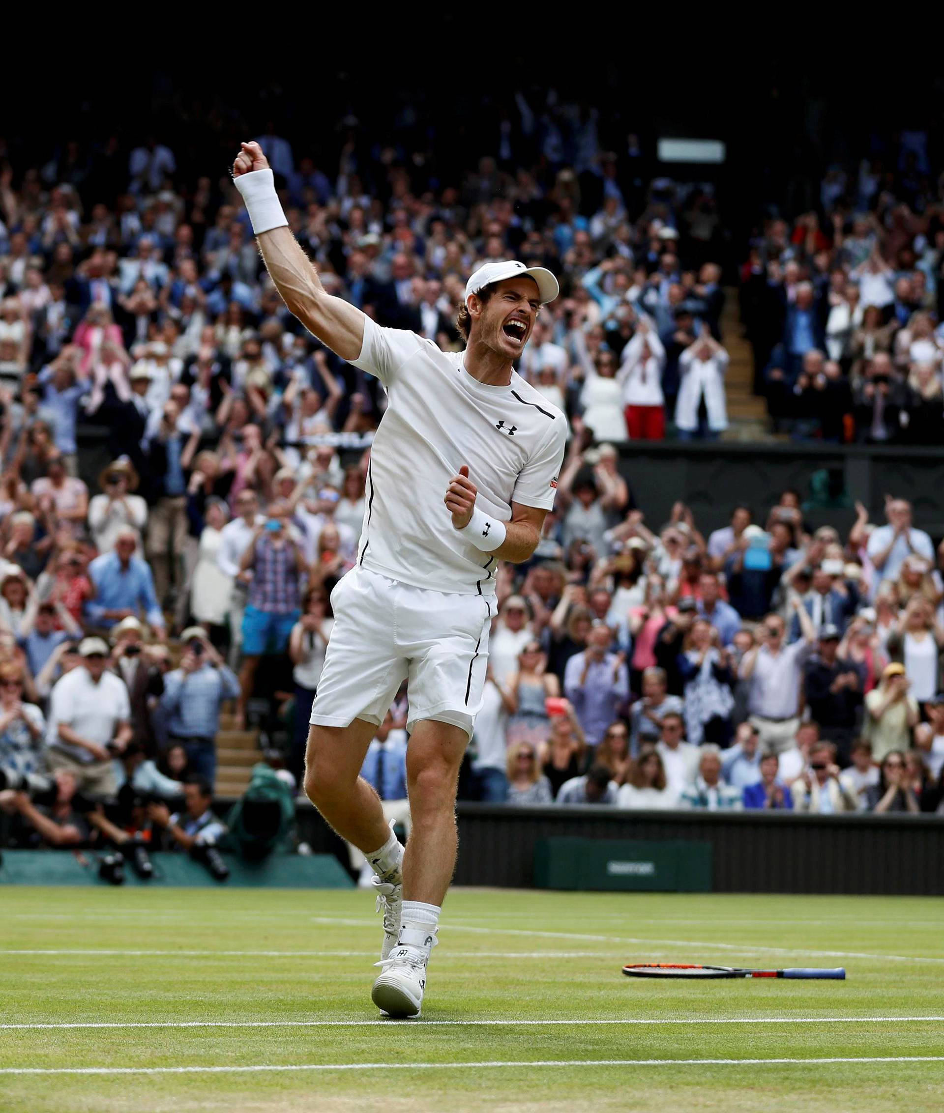 FILE PHOTO: Britain's Andy Murray celebrates winning Wimbledon in Wimbledon, England - 10/7/16