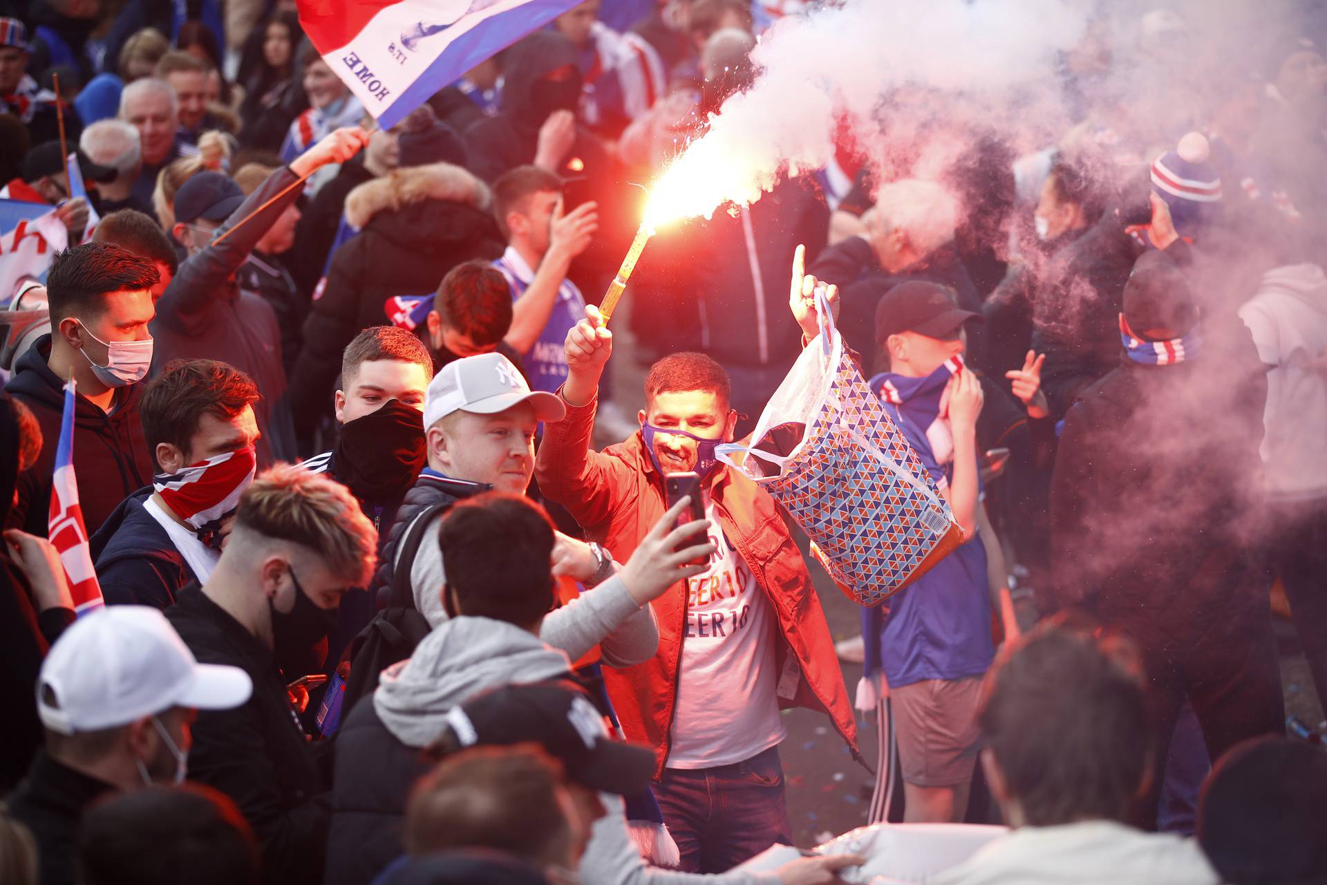 Rangers fans celebrate winning the Scottish Premiership Title