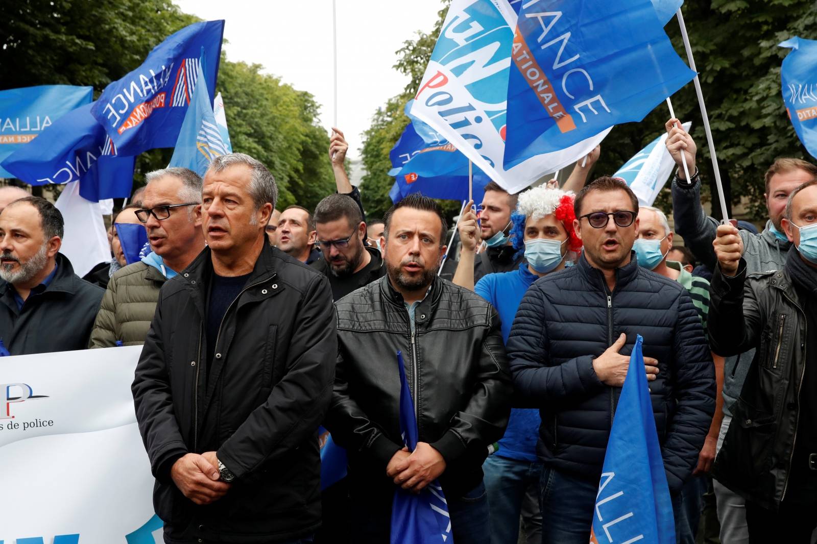 Police officers attend a demonstration in Paris