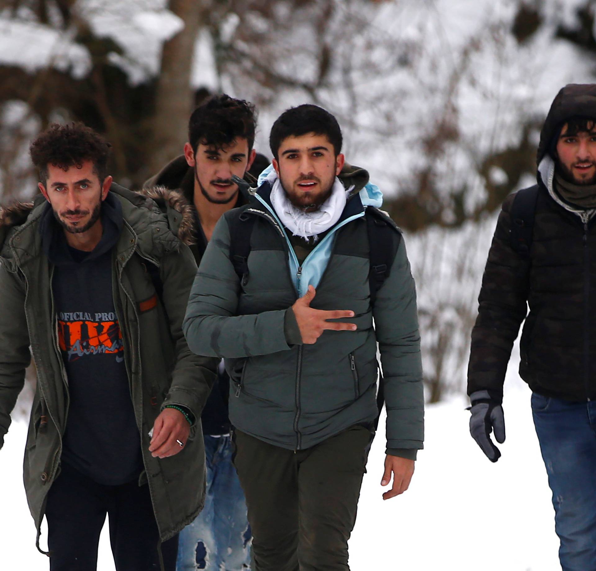 A group of migrants attempt sto illegally cross the border into Croatia on the Pljesevica Mountain near Bihac