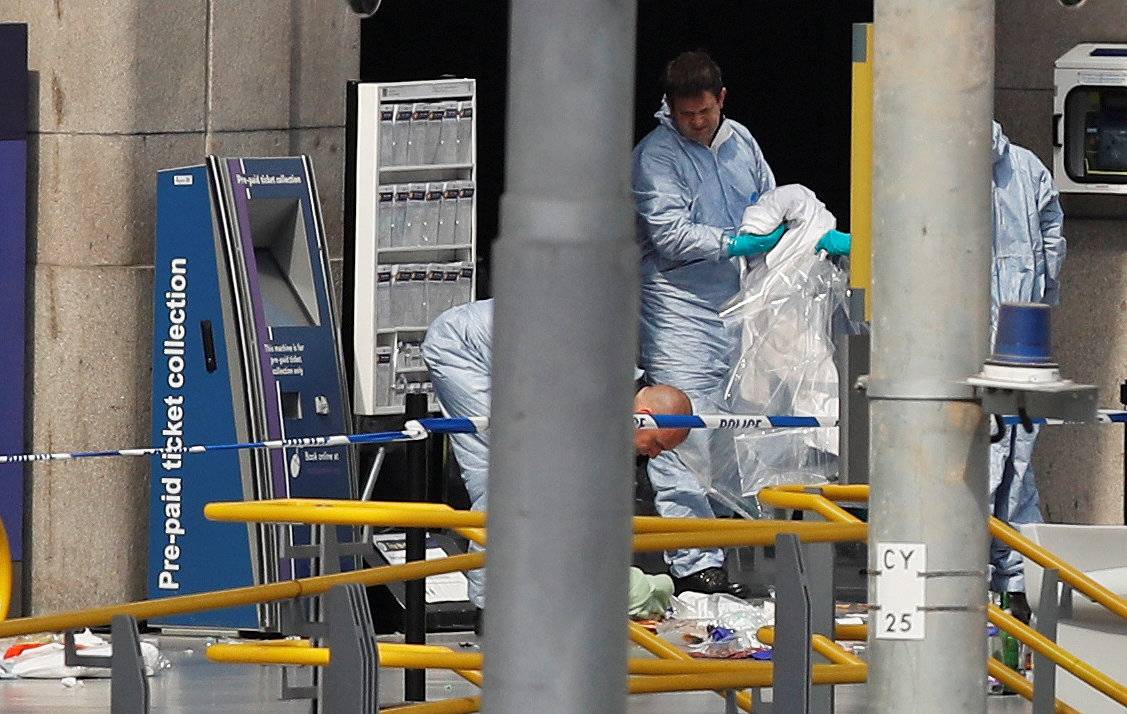 Forensics investigators work at the Manchester Arena in Manchester