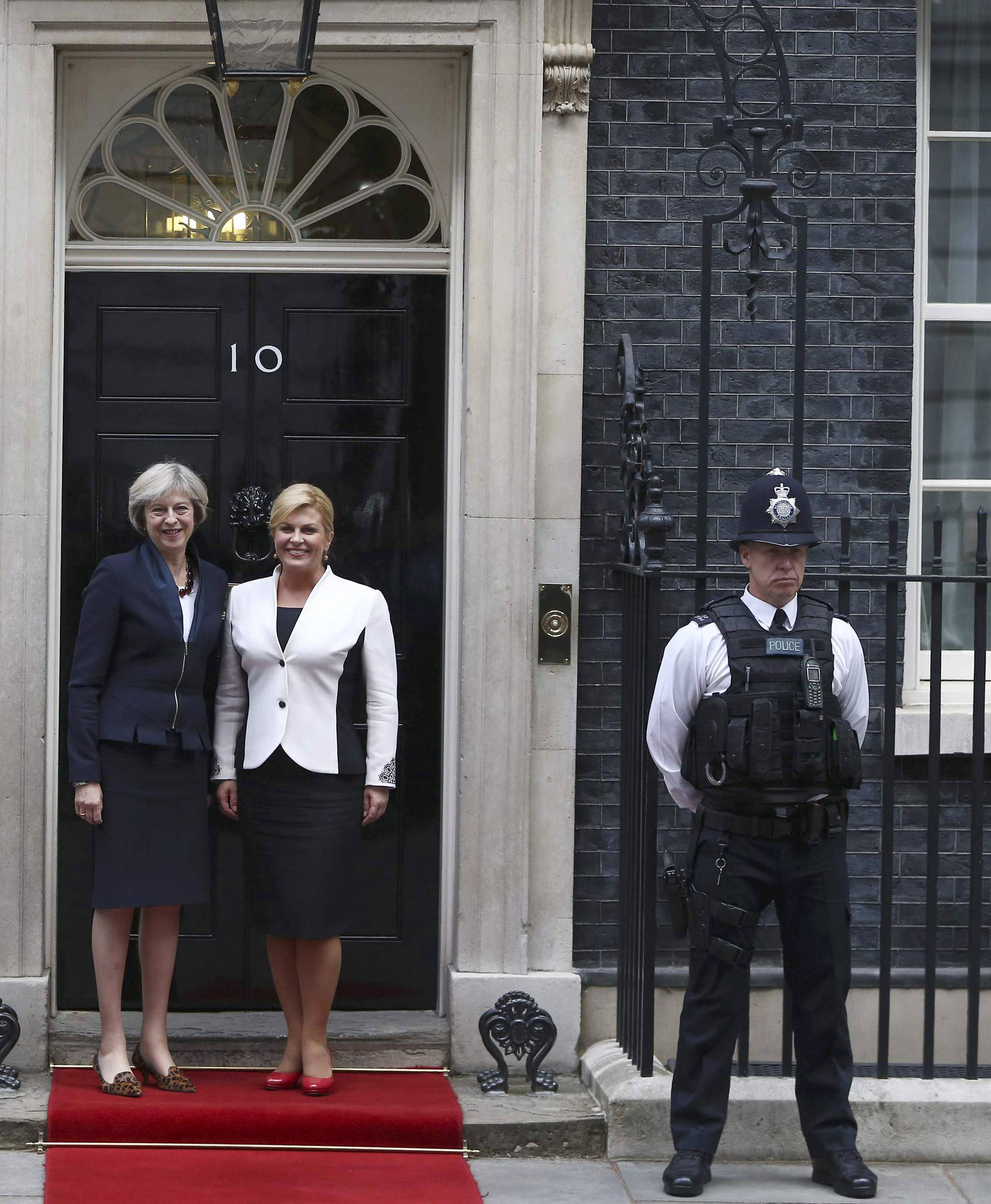 Britain's Prime Minister Theresa May greets Croatia's President Kolinda Grabar-Kitarovic at Downing Street in London