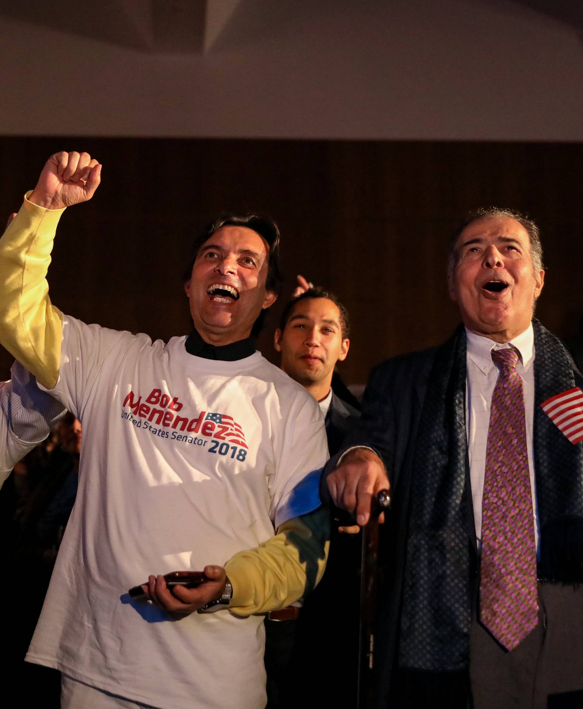 Supporters of Democratic U.S. Senator Bob Menendez, react at his victory during a midterm election night party in Hoboken, New Jersey