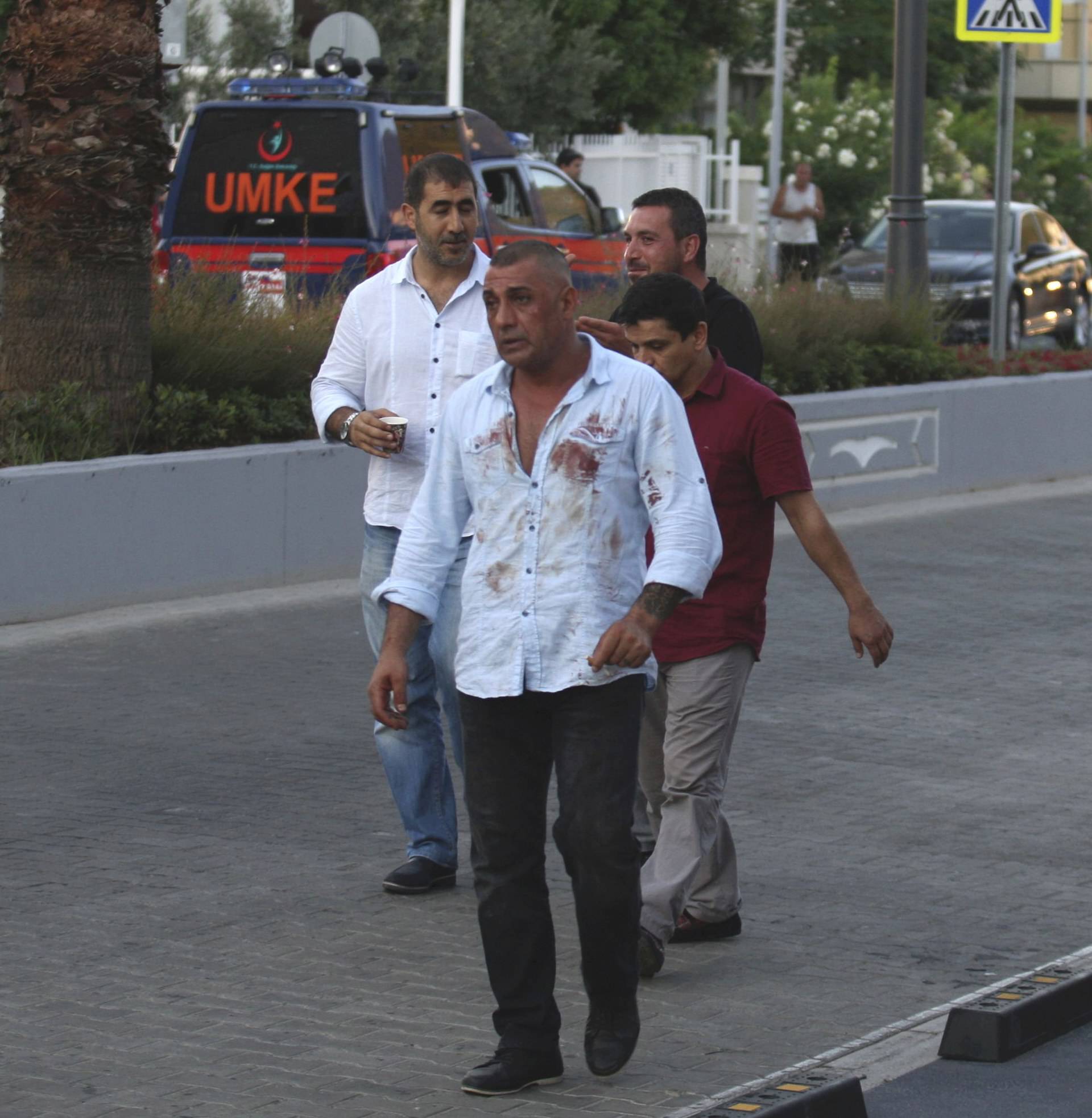 Plain clothes policemen are seen on a street in the resort town of Marmaris