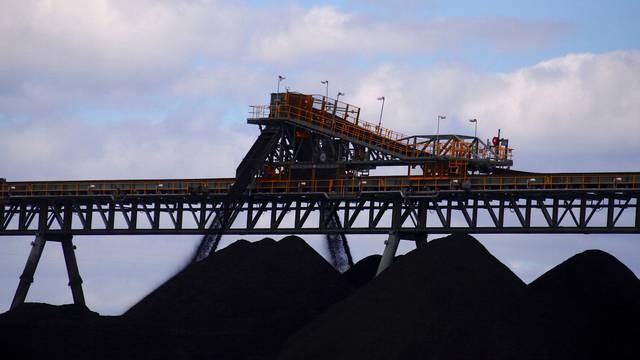 FILE PHOTO: Coal is unloaded onto large piles at the Ulan Coal mines near the central New South Wales rural town of Mudgee, Australia