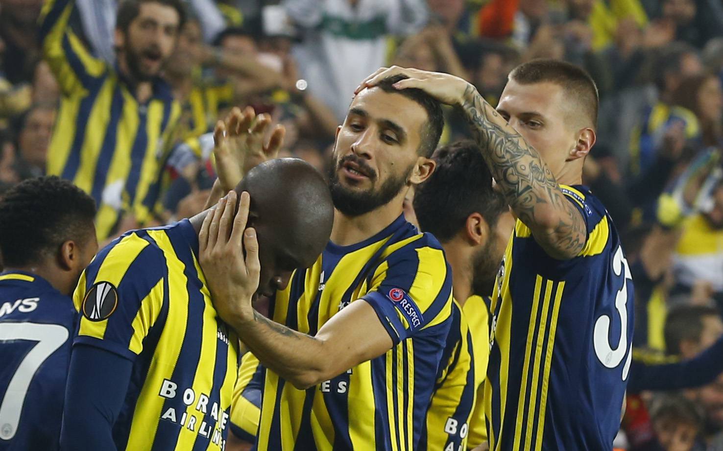 Fenerbahce's Moussa Sow celebrates scoring their first goal with team mates