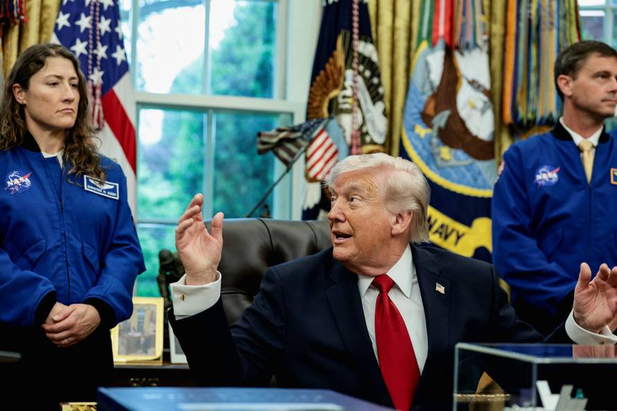 U.S. President Donald Trump meets Artemis II astronauts in the Oval Office at the White House in Washington