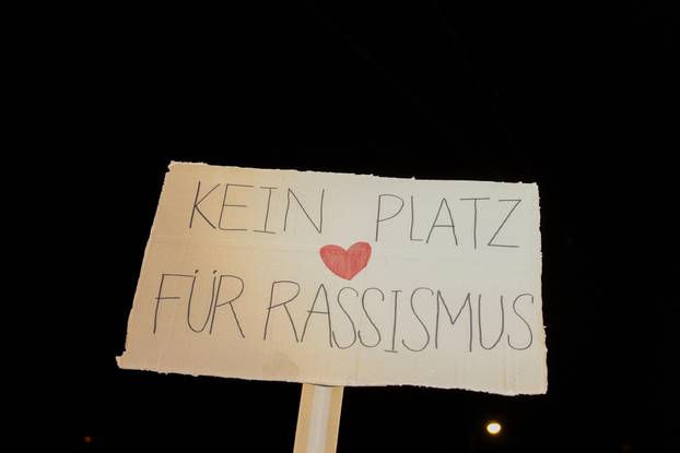 People attend a protest against Freedom Party after general elections in Vienna
