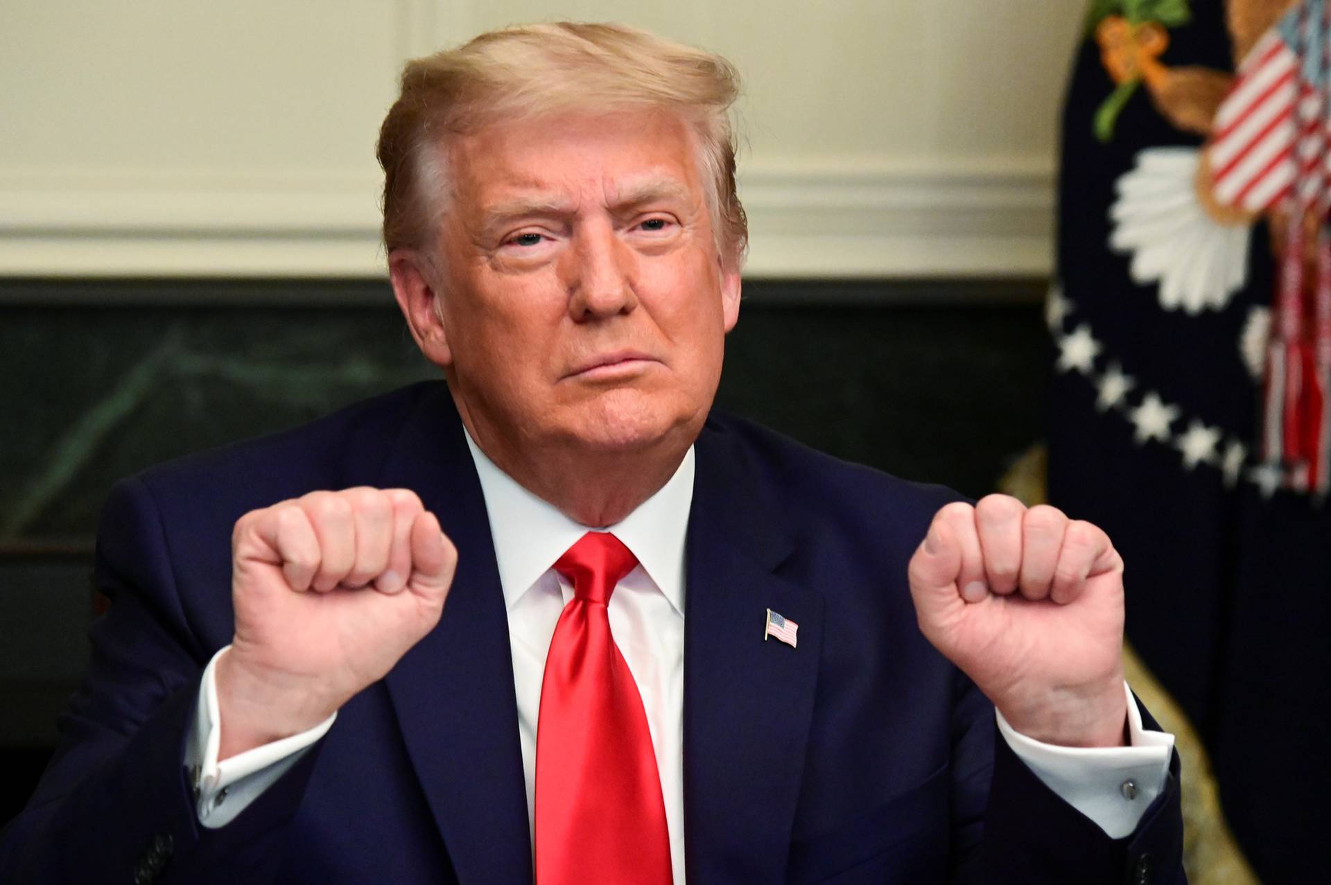 U.S. President Donald Trump participates in a Thanksgiving video teleconference with members of the military forces