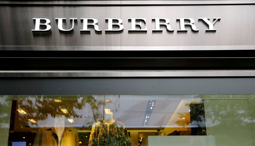 FILE PHOTO: Logo of British luxury brand Burberry is seen at a shop in Zurich
