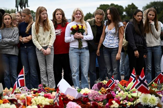Mourners gather outside the Royal Palace, following the death of Norway's King Harald, in Oslo