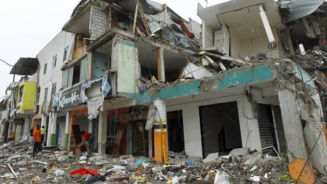 A collapsed building is seen in Pedernales, after an earthquake struck off Ecuador's Pacific coast