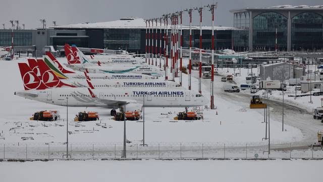 A general view of parked planes at Istanbul airport, which is suspending flights due to heavy snowfall, in Istanbul