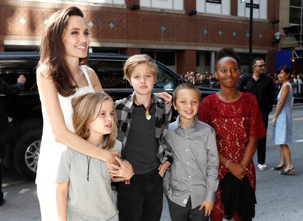 Jolie arrives on the red carpet with her children for the film "The Breadwinner"  during the Toronto International Film Festival in Toronto