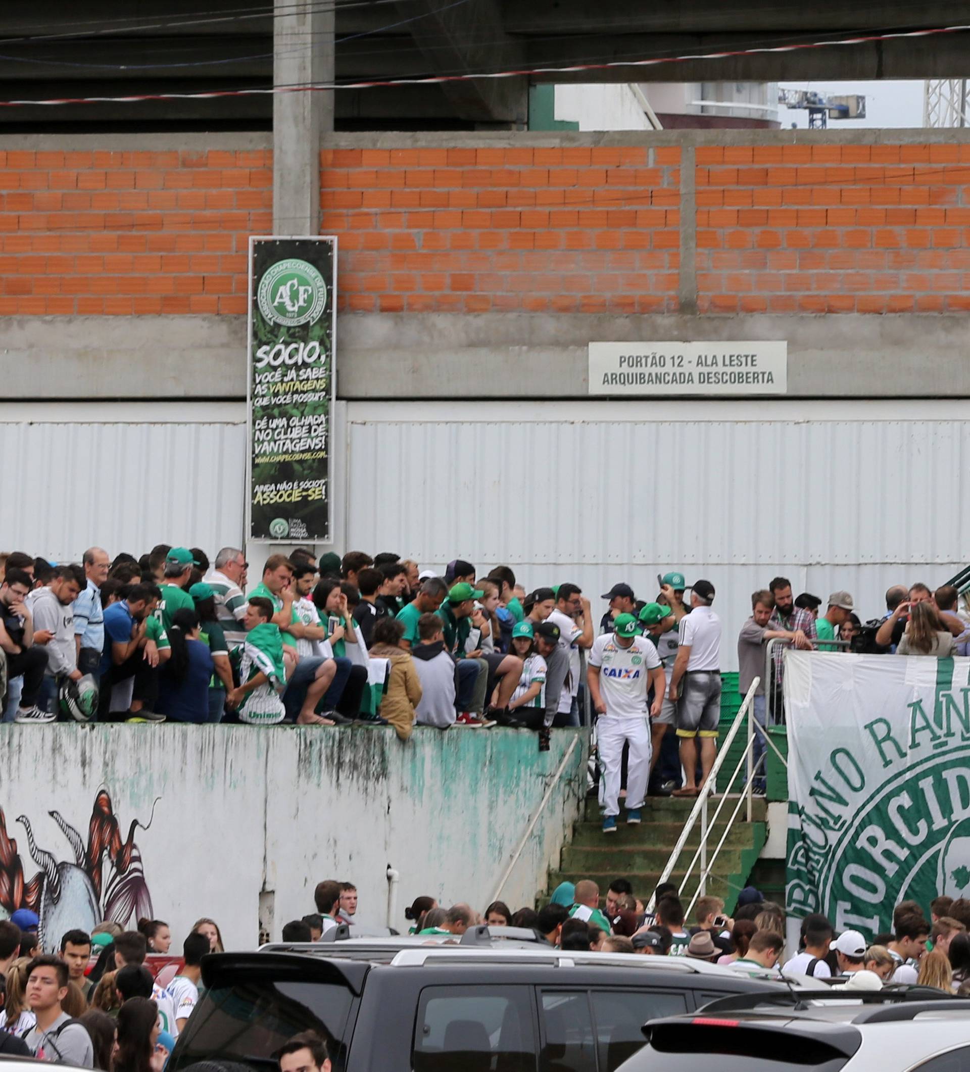 Fans of Chapecoense soccer team are pictured in front of the Arena Conda stadium in Chapeco