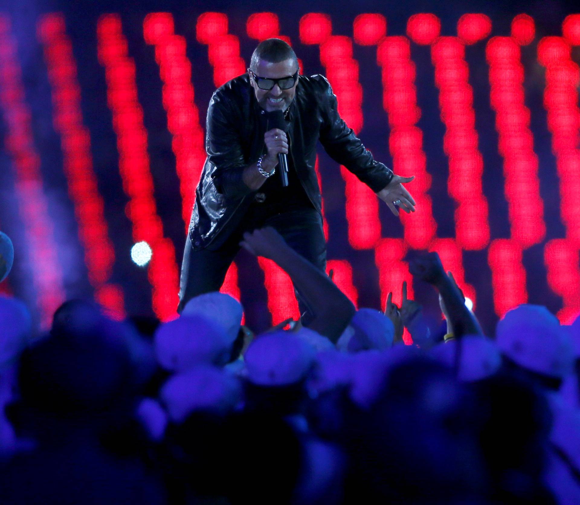 FILE PHOTO: Singer George Michael performs during the closing ceremony of the London 2012 Olympic Games at the Olympic Stadium
