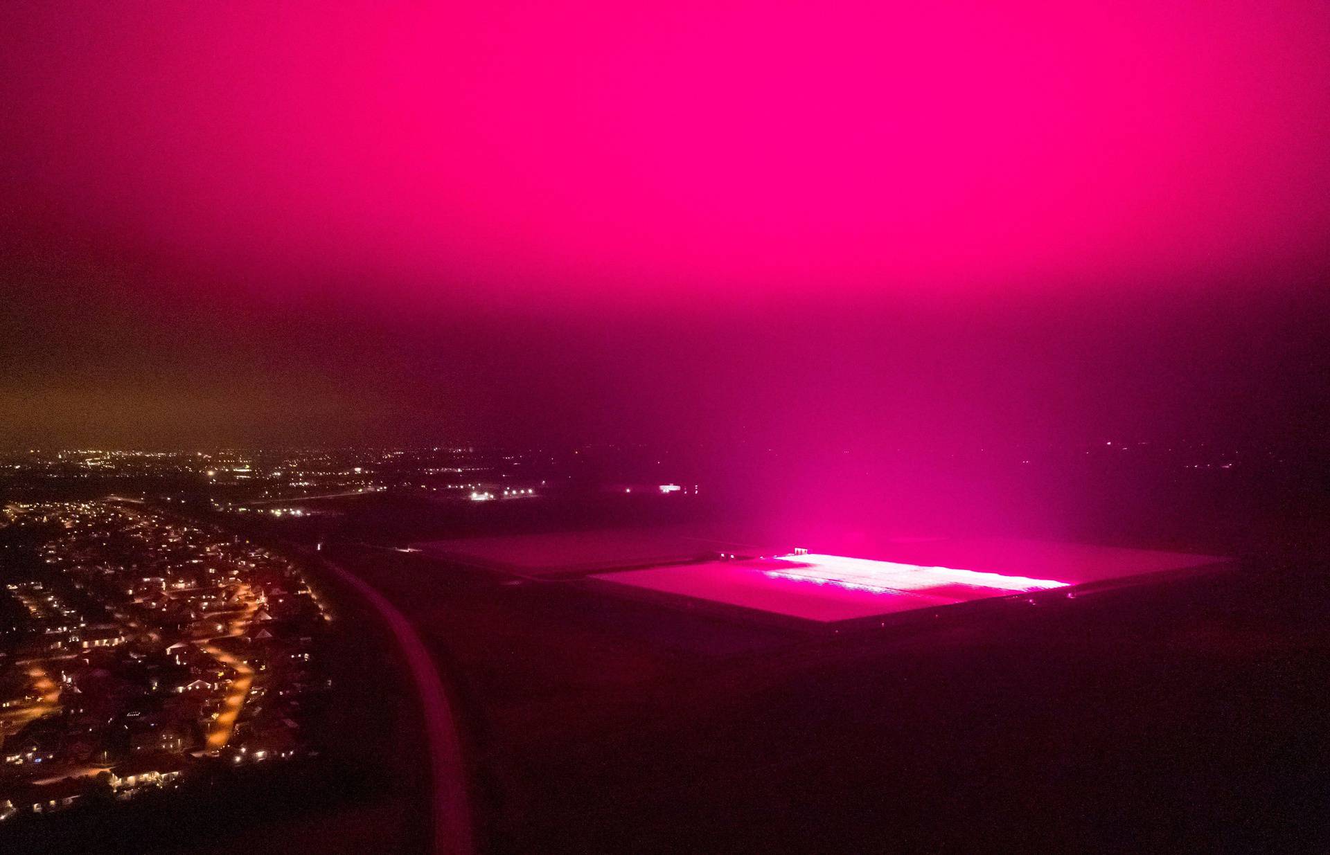 New greenhouse lighting causes the sky to turn purple, Trelleborg, Sweden - 25 Nov 2020