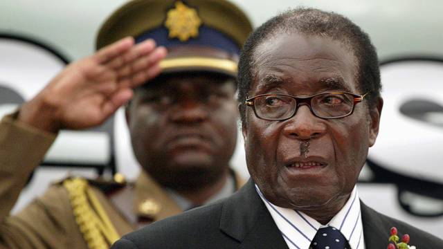 FILE PHOTO -  File photo of Zimbabwe President Mugabe attending the launch of basic commodities in Harare