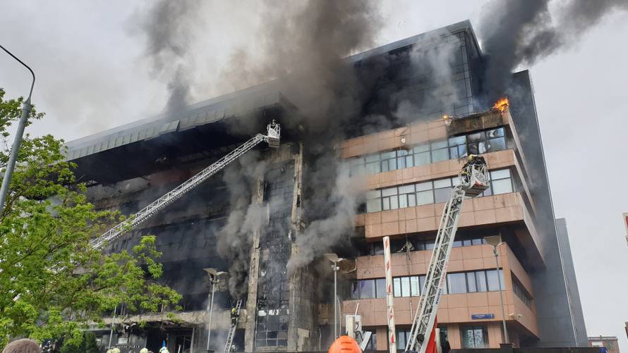 Firefighters extinguish a fire at a business centre in Moscow