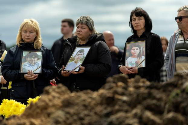 Funeral of the Tamara, Stanislav and Roman Martyniuk who were killed in a Russian missile strike in Korostyshiv