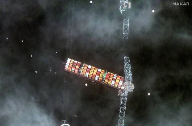 A satellite image shows a closer view of the Dali container ship and a collpased Francis Scott Key Bridge, in Baltimore, Maryland