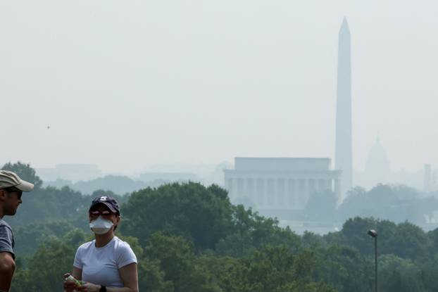 Smoke from Canadian wildfires clouds the National Mall and monuments in Washington